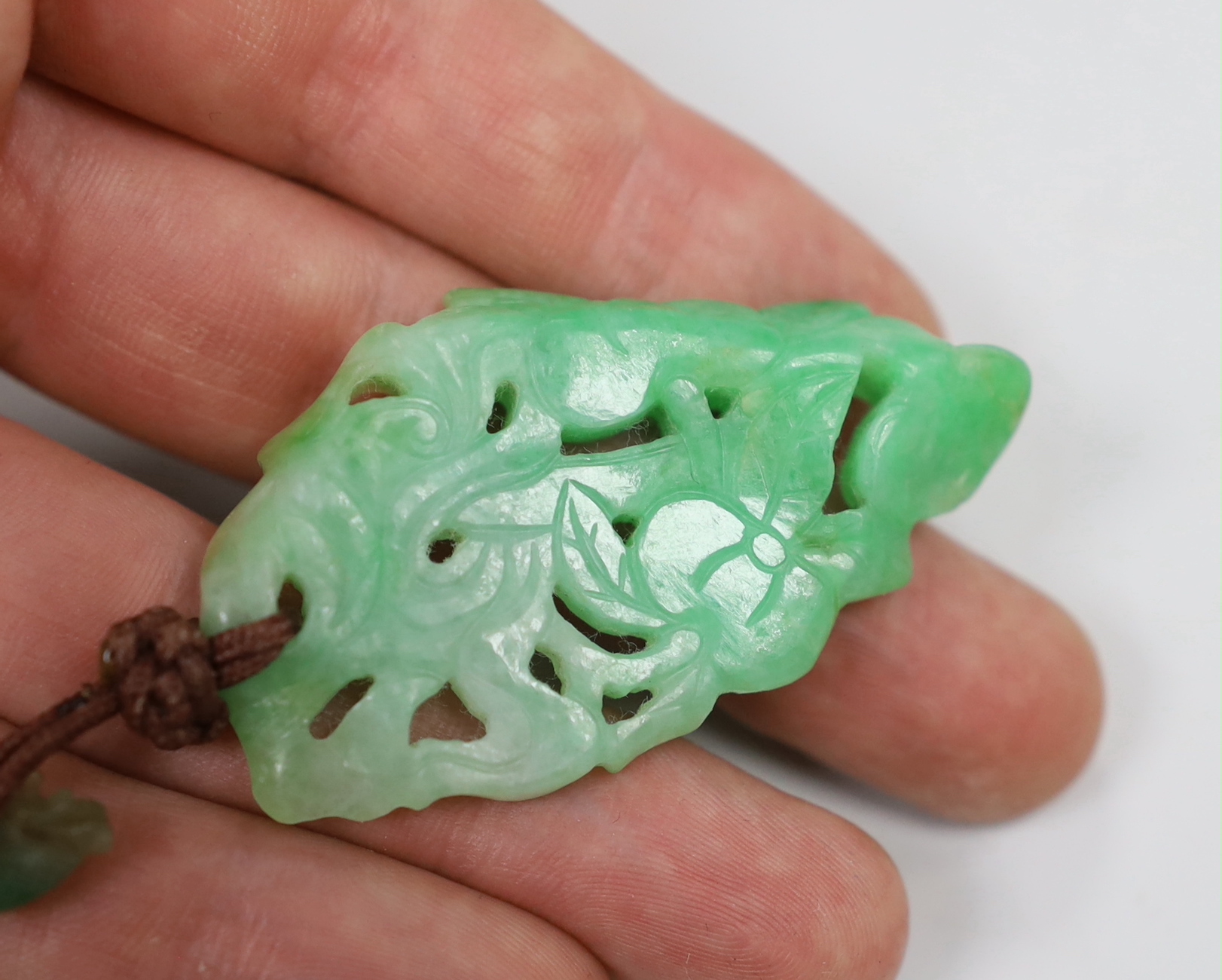 Two jadeite carvings, fish and fruit